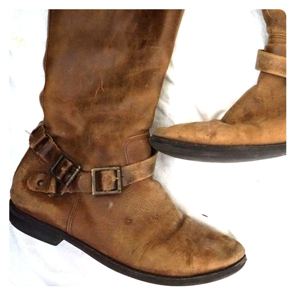 Dark brown leather riding boots.
